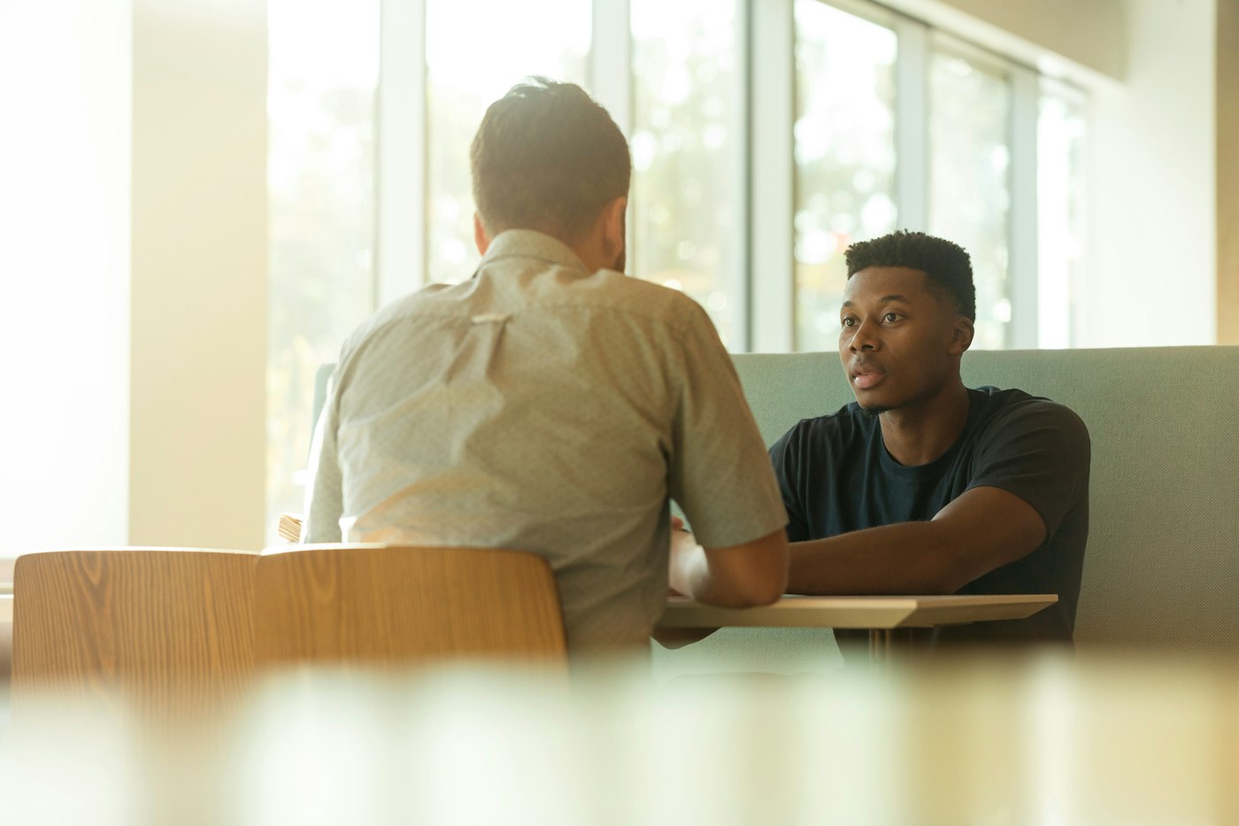 Two men in conversation