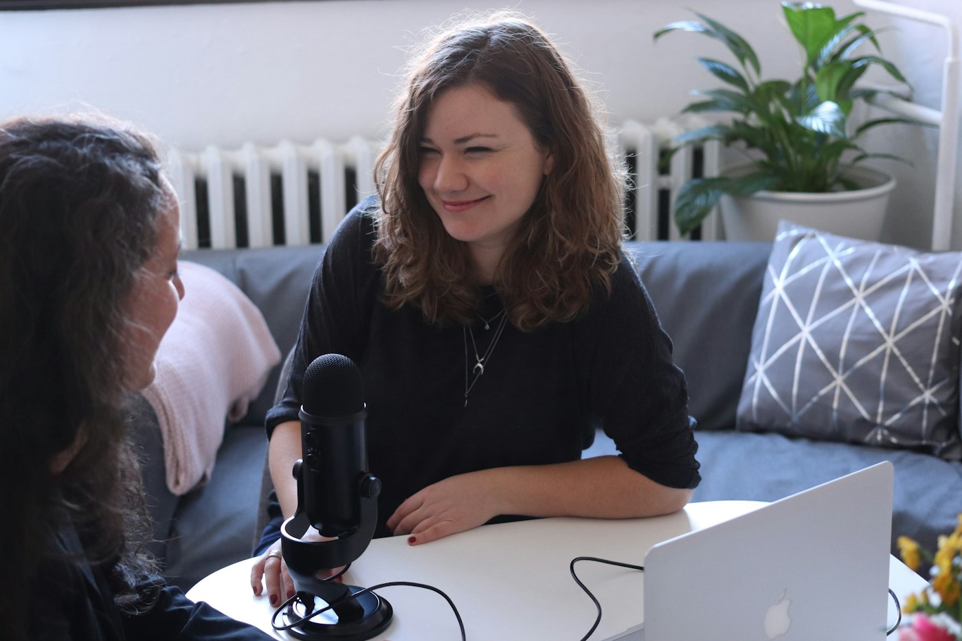 Two women talking and smiling